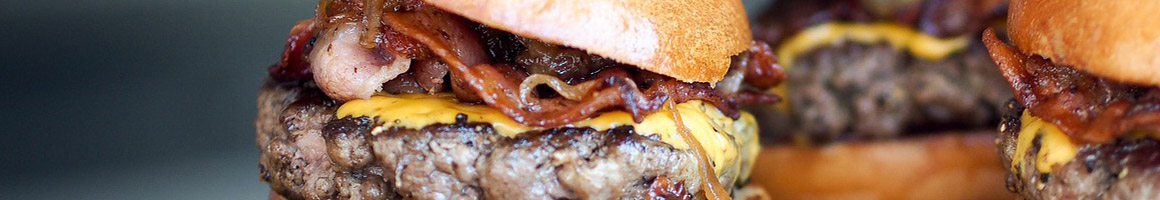 Eating Breakfast & Brunch Burger Sandwich at Peppermints restaurant in Henrietta, NY.